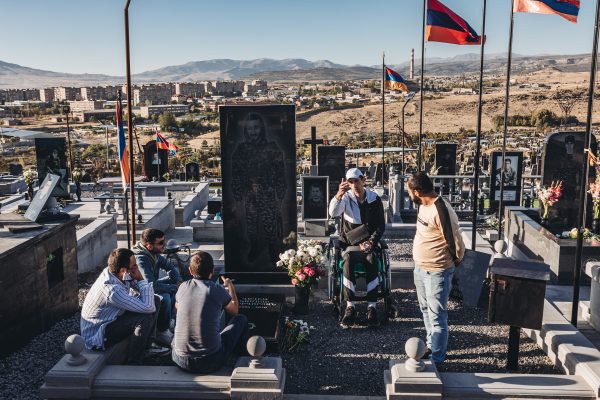 Norik with some veteran soldiers of Karabakh war, in the cemetery of Abovyan, to remember a friend who died in the Karabakh war (2020)
